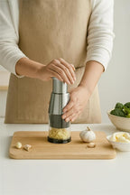 Stainless Steel Garlic Press Mincer with Comfortable Grip, Built-in Spring, 6.3 Inch Height, Clear Collection Cup