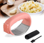 Garlic Press Rocker Stainless Steel, Garlic Crusher with Peeler & Cleaning Brush, Easy to Use Garlic Mincer for Kitchen Cooking, Ergonomic Garlic Chopper Tool, Durable Garlic Presser Gadget (Pink)
