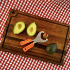 Avocado Tool, Kitchen Utensil with Hinged Handles, Wedge-Shaped Jaws for Pit Removal (Orange)