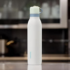 Owala FreeSip Twist Insulated Stainless Steel Water Bottle with Straw for Sports and Travel, BPA-Free, 18-oz, Mint/White (Iced Breeze)