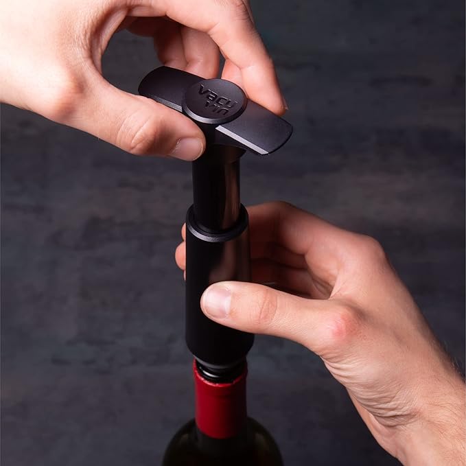 Vacu Vin Wine Saver Pump Pink with Vacuum Wine Stopper - Keep Your Wine Fresh for up to 10 Days - 1 Pump 4 Stoppers - Reusable - Made in the Netherlands
