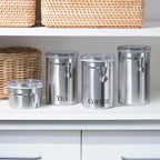 Oggi Stainless Steel Coffee Canister 62 fl oz - Airtight Clamp Lid, Clear See-Thru Top - Ideal for Coffee Bean Storage, Ground Coffee Storage, Kitchen Storage, Pantry Storage. Large Size 5" x 7.5".