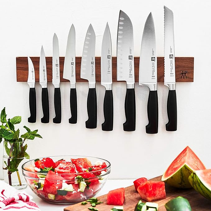 ZWILLING Four Star 7-inch Hollow Edge Santoku Knife