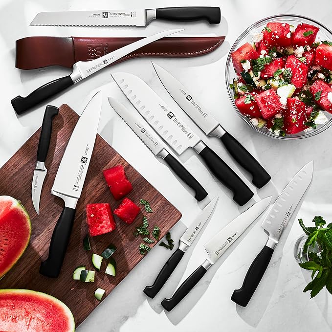 Zwilling J.A. Henckels Twin Four Star 5.5 Inch Hollow Edge Santoku
